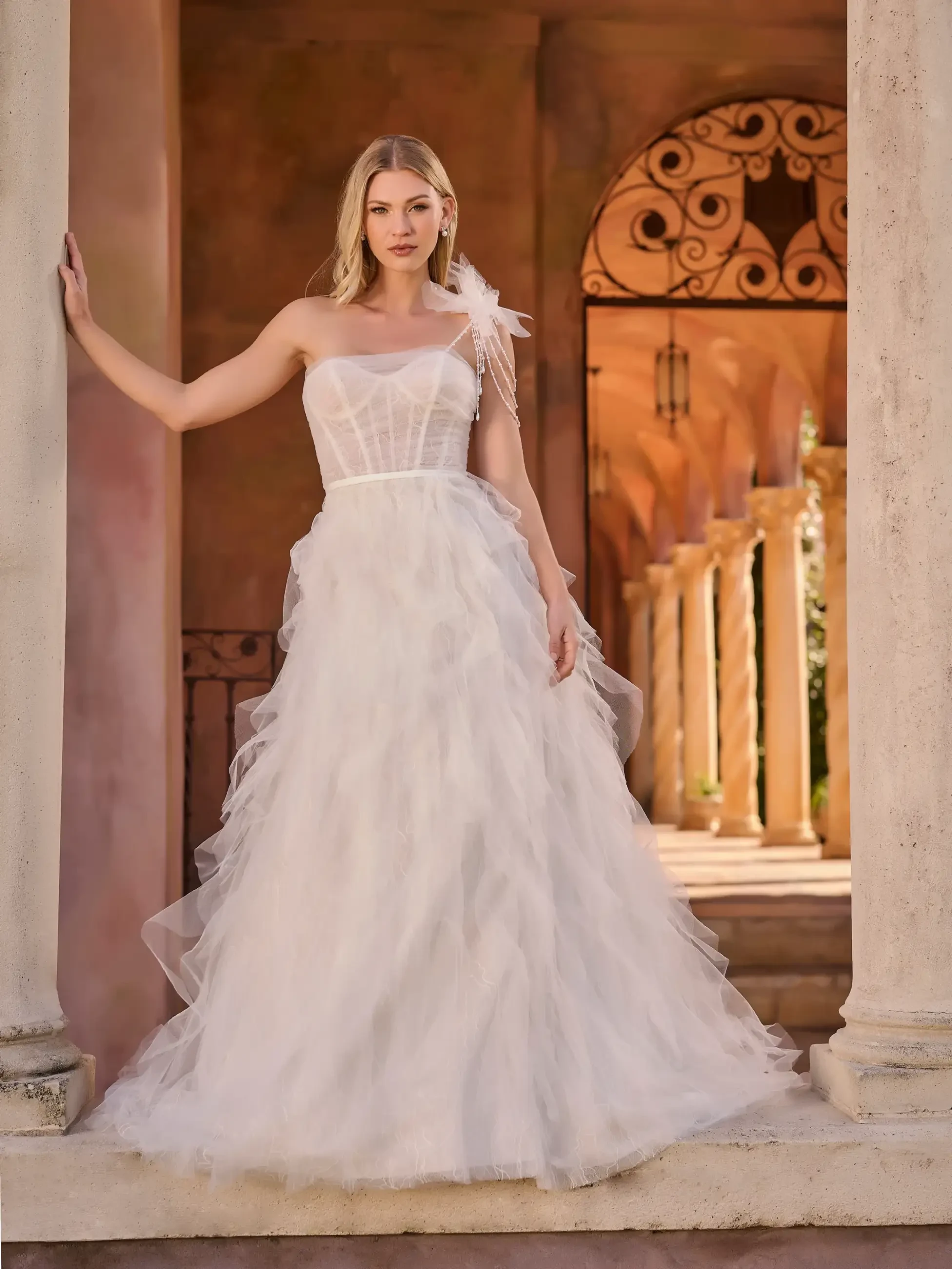 model is wearing a strapless a-line wedding dress