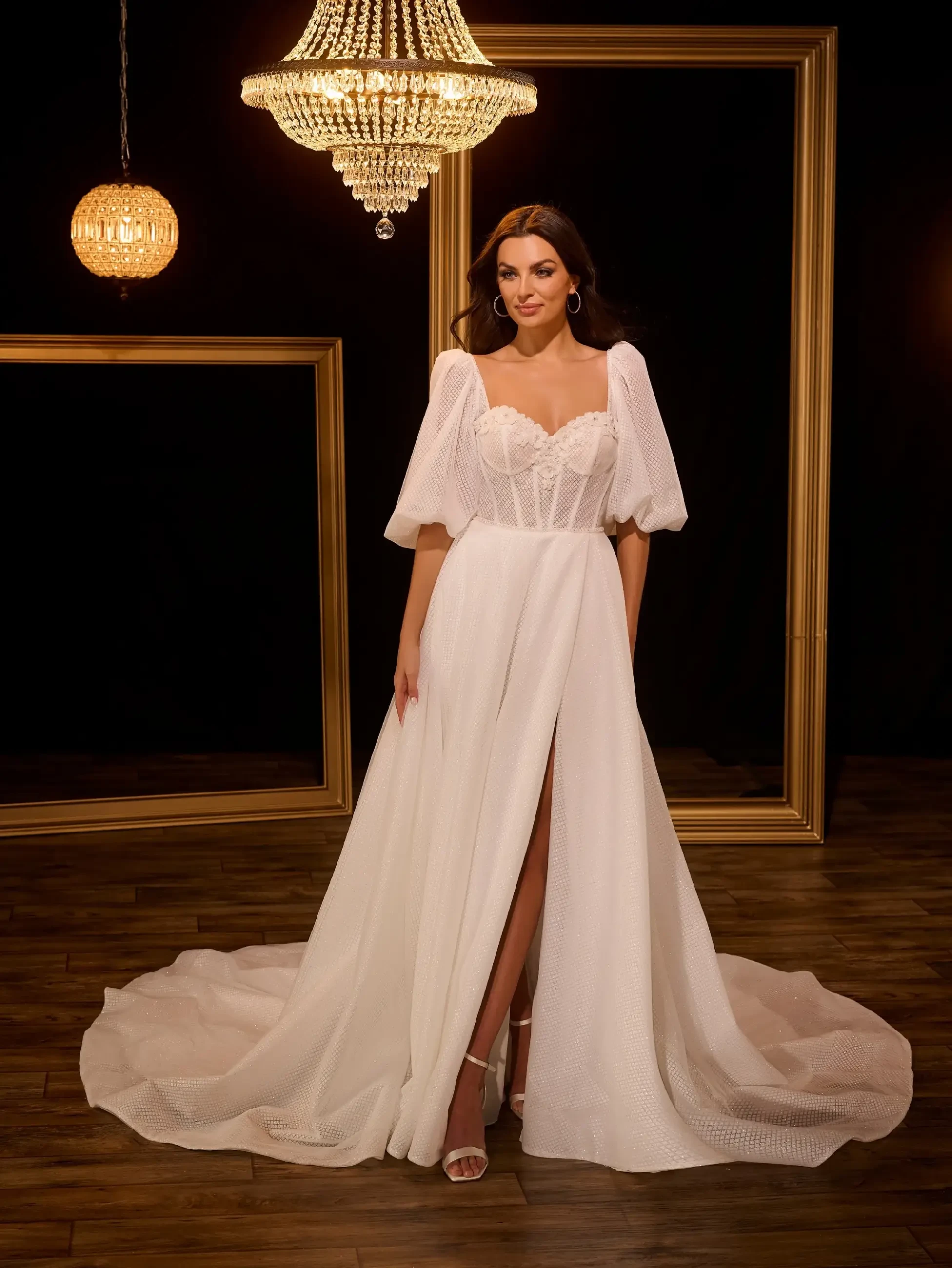 model is wearing a blouson sleeve a-line wedding dress