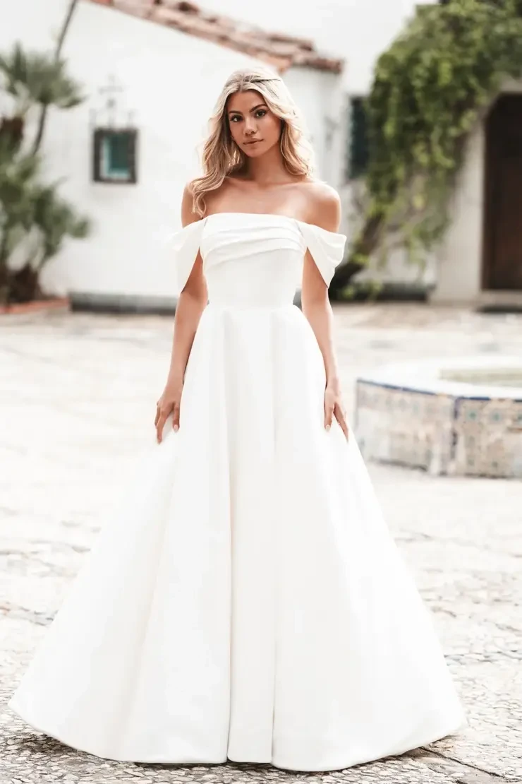 What is the Difference Between Wedding Dress Alterations, Modifications, and Custom Changes? Image