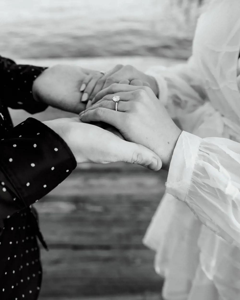 Photo of the holding hands of real bride and groom