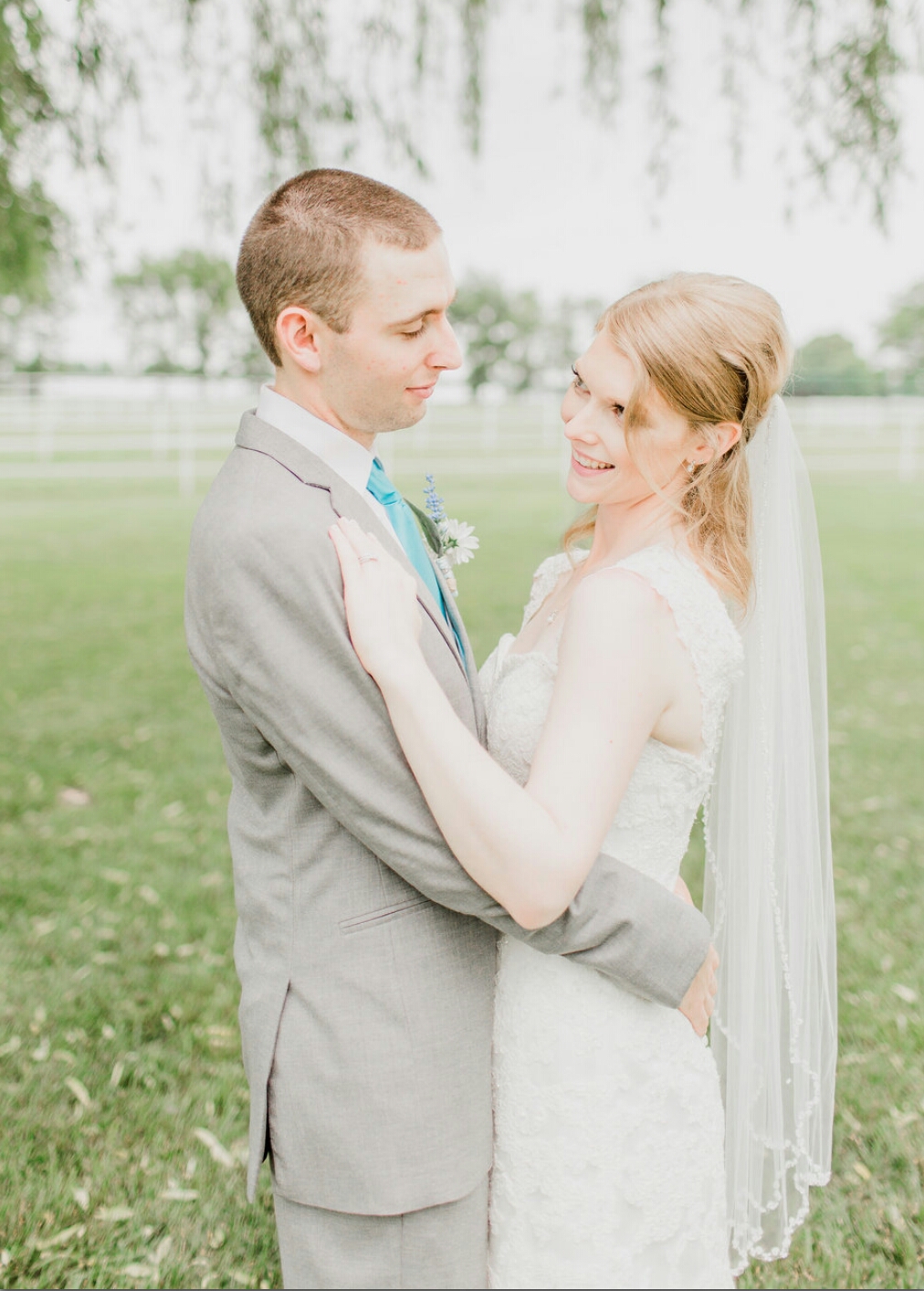 Photo of the bride and groom looking at each other